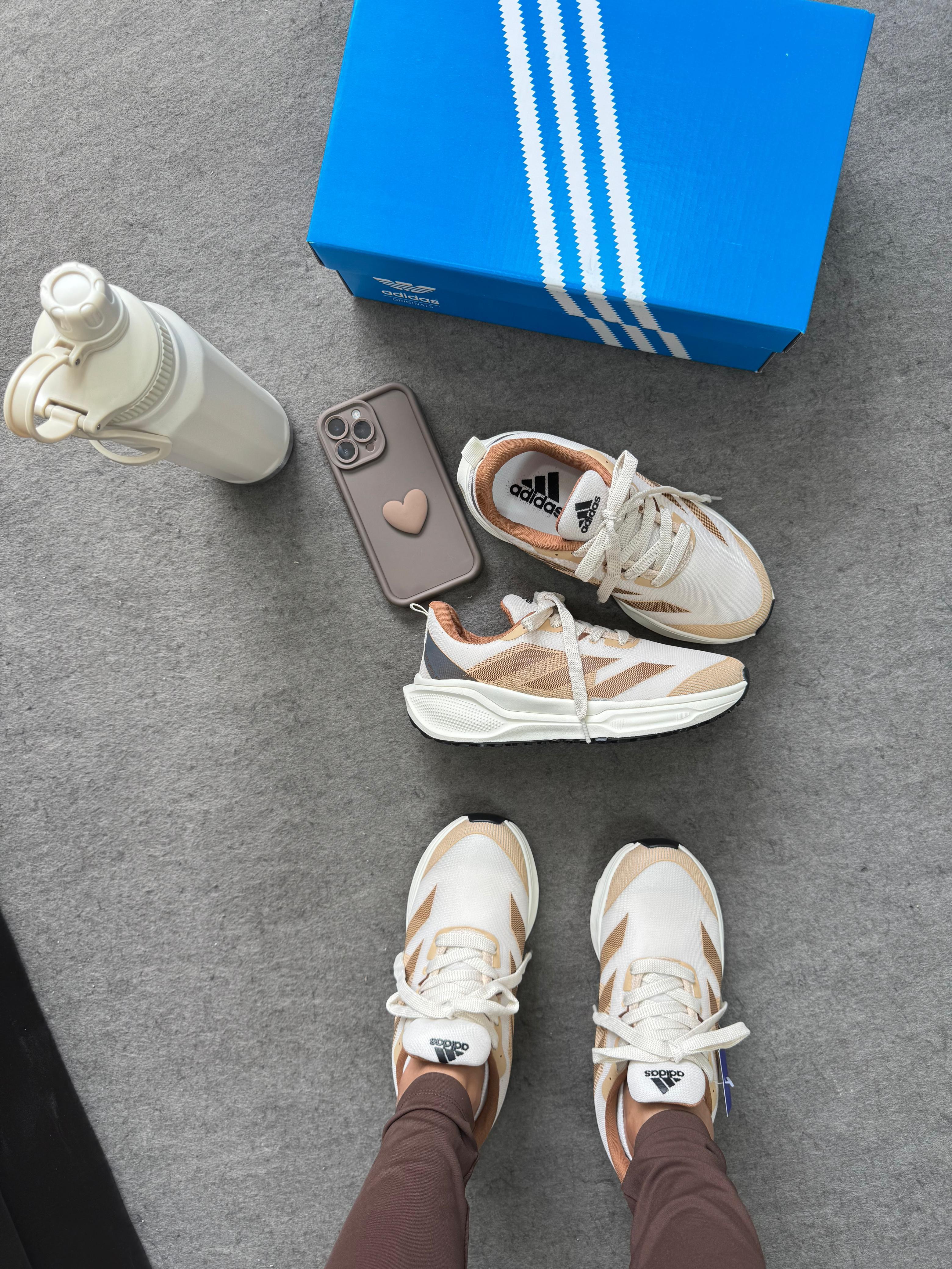 Adizero Boston 12 — traseiro